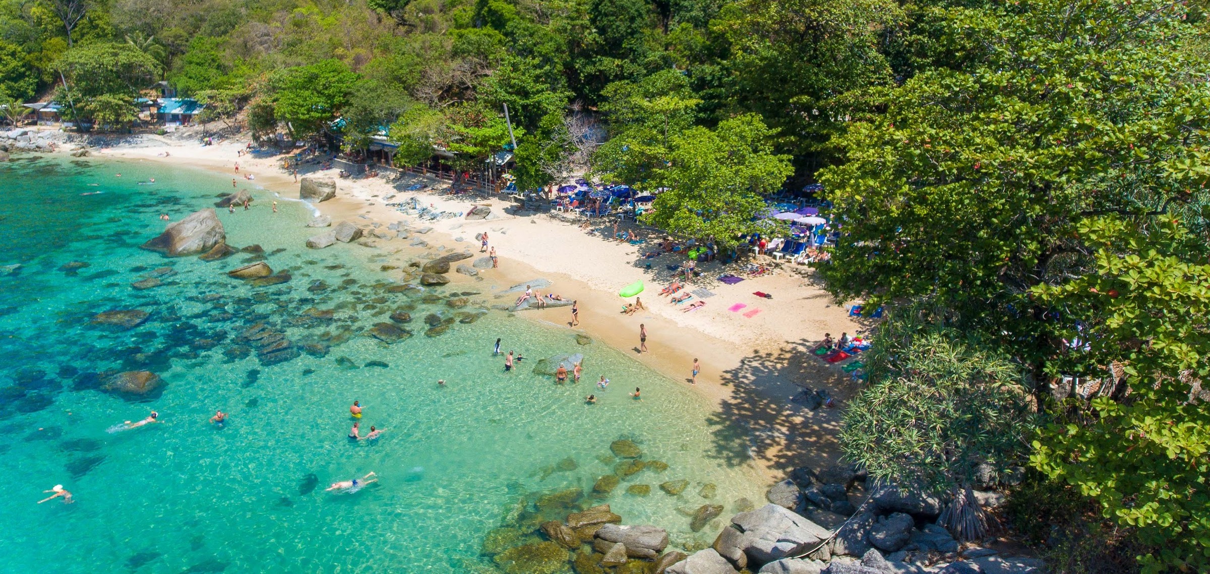 Ya Nui beach under Promthep Cape, Phuket, where the snorkelling starts at the waterline